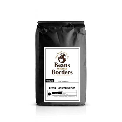 Black coffee bag with Beans Without Borders label for fresh roasted coffee